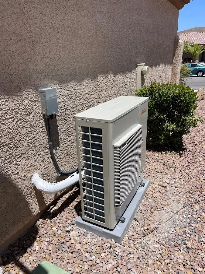 Residential air conditioning condenser unit in Hitchcock