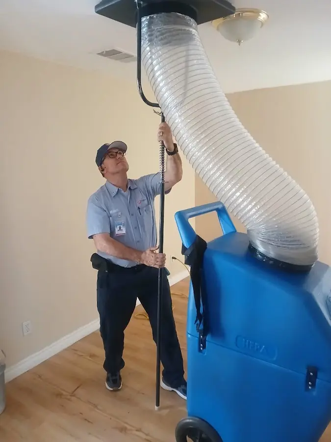 HVAC Installation technician using HEPA equipment in Hitchcock